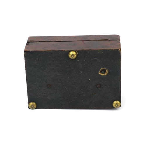 41 - Miniature yew music box, the hinged lid opening to reveal a brass cylinder playing on two airs, the ... 