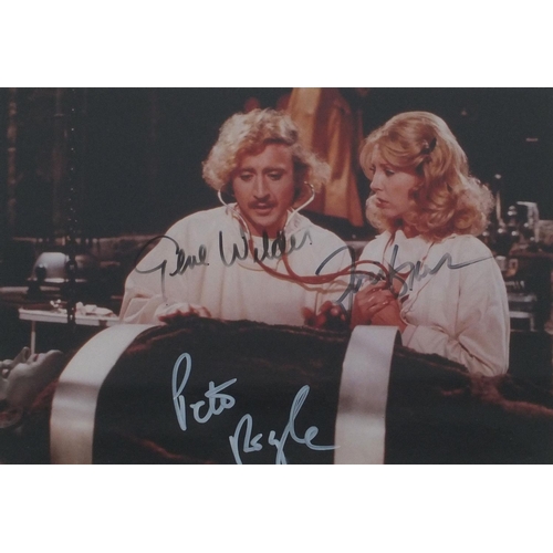 258 - Coloured Frankstein photograph signed by Gene Wilder, Pats Brawl and Teri Garr, mounted and framed, ... 