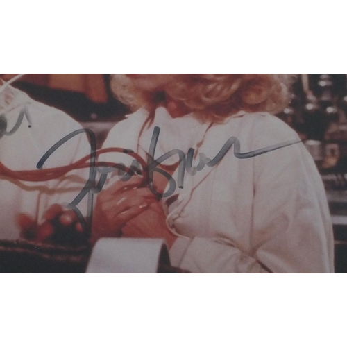 258 - Coloured Frankstein photograph signed by Gene Wilder, Pats Brawl and Teri Garr, mounted and framed, ... 