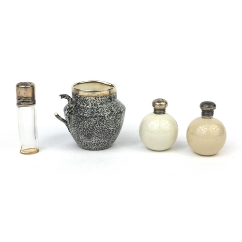 2441 - Three silver topped souvenir china items, together with a silver topped scent bottle, the souvenir c... 