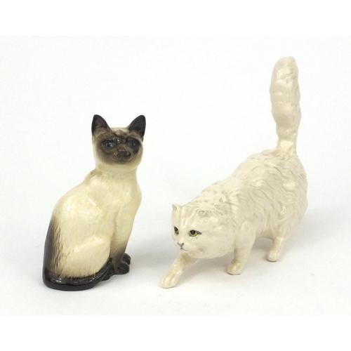 2177 - Two Royal Doulton cats, both with factory marks to the bases, one numbered 1887, the largest 18cm in... 