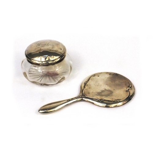 2474 - Art Nouveau silver hand mirror and a glass powder pot with silver lid, both Birmingham hallmarked, t... 