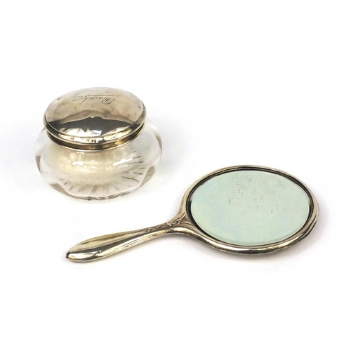 2474 - Art Nouveau silver hand mirror and a glass powder pot with silver lid, both Birmingham hallmarked, t... 