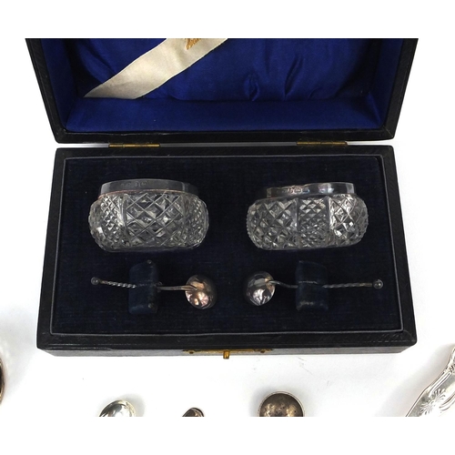 2458 - Assorted silver items including a Scottish silver spoon, pair of cut glass salts with silver collars... 