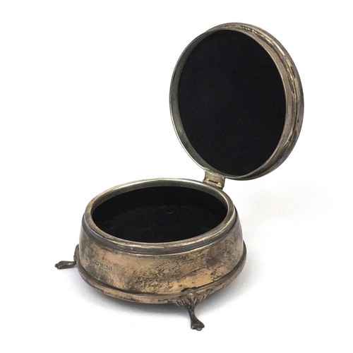 2432 - Mappin & Webb circular silver three footed jewel box, the hinged lid with engine turned decoration a... 