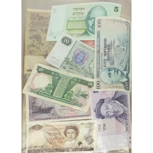 311 - Large collection of World bank notes, including Honk Kong United, States of America and the Middle E... 