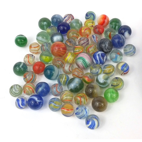 426 - Victorian and later glass marbles, with wooden solitaire board, the solitaire board 26cm in diameter