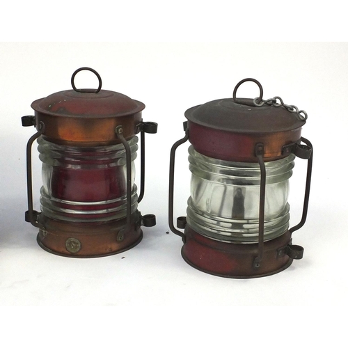 175 - Four copper and glass ship's lanterns including a pair of cylindrical seahorse examples, three with ... 