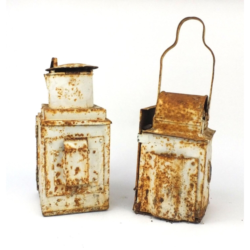 177 - Two white painted railway lamps with coloured glass panels and ceramic burners including a B.R.I.M e... 