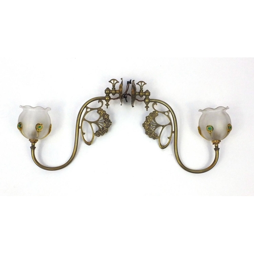 796 - Pair of Art Nouveau brass wall lights, the frilled glass shades with applied decoration, the brass f... 