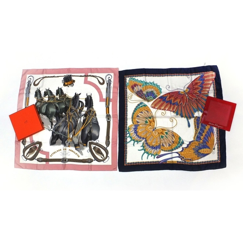 94 - Two silk scarves comprising a Hermes Attelage En Arbaléte example and a Salvatore Ferragamo example,... 