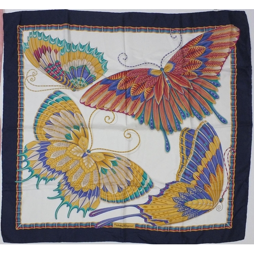 94 - Two silk scarves comprising a Hermes Attelage En Arbaléte example and a Salvatore Ferragamo example,... 