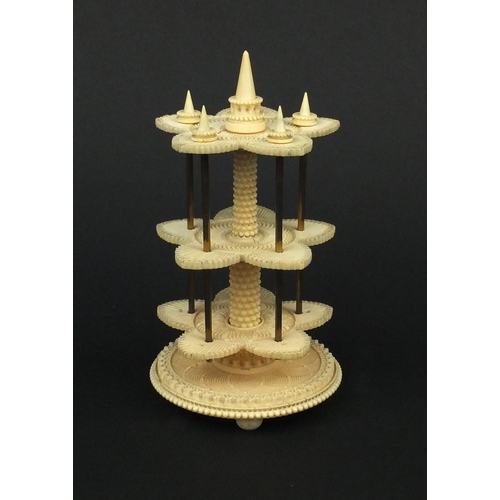 8 - Georgian turned and carved ivory three tier cotton reel stand, 17.5cm high