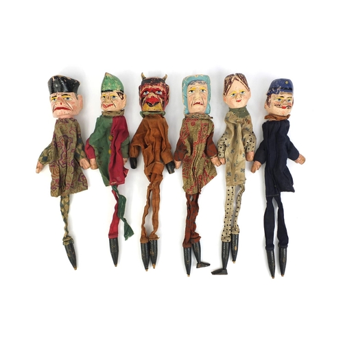 403 - Group of six 19th century hand painted wooden and cloth finger puppets including Punch, Devil and Mr... 