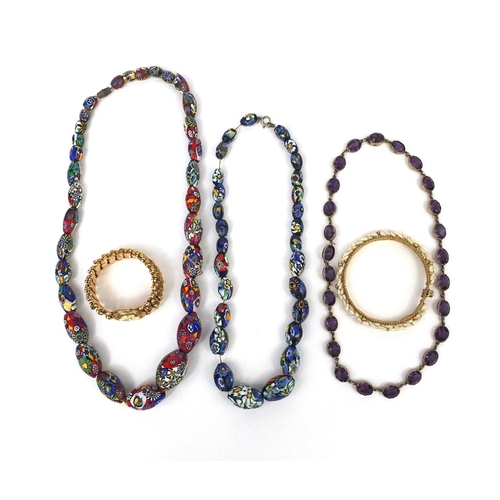 1022 - Assorted jewellery comprising two Venetian hand painted bead necklaces, an amethyst necklace, gilt m... 