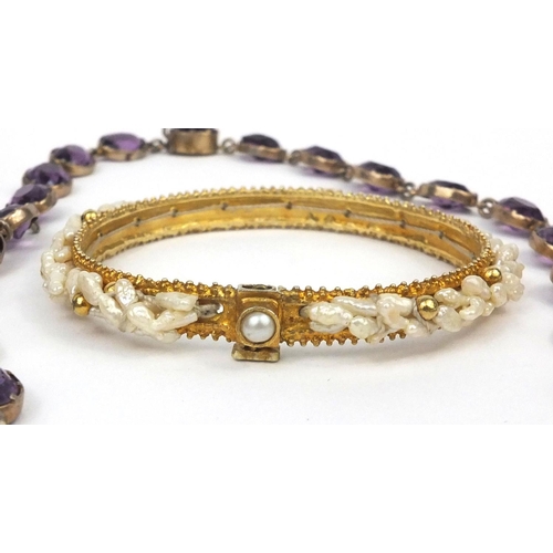 1022 - Assorted jewellery comprising two Venetian hand painted bead necklaces, an amethyst necklace, gilt m... 