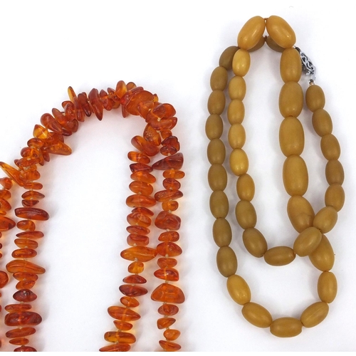 1029 - Selection of amber coloured bead necklaces and loose beads, approximate weight 438.4g