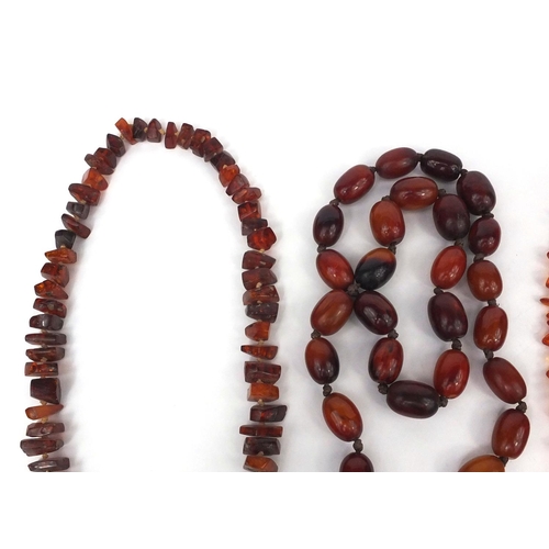 1029 - Selection of amber coloured bead necklaces and loose beads, approximate weight 438.4g