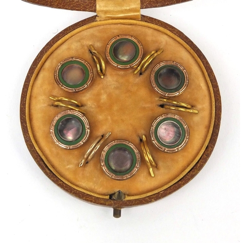 1025 - Cased set of six gilt metal abalone and green enamel buttons, 1.5cm in diameter