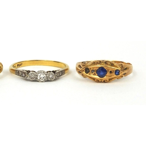 945 - Four 18ct gold rings set with turquoise, diamonds and sapphires, various sizes, approximate weight 8... 