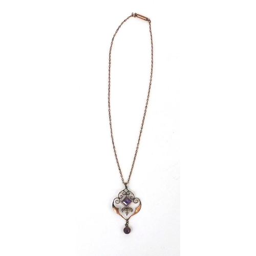 974 - Edwardian 9ct gold amethyst and seed pearl pendant on a gold coloured metal necklace, the pendant 4.... 