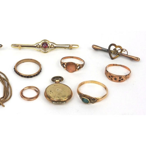 1002 - Selection of mostly gold jewellery including two 9ct gold bar brooches, unmarked gold rings set with... 