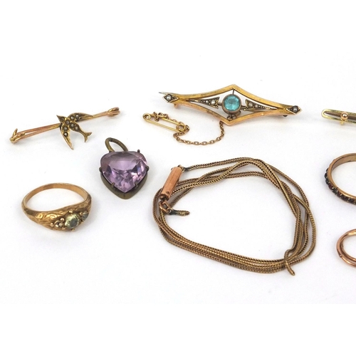 1002 - Selection of mostly gold jewellery including two 9ct gold bar brooches, unmarked gold rings set with... 