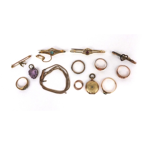 1002 - Selection of mostly gold jewellery including two 9ct gold bar brooches, unmarked gold rings set with... 