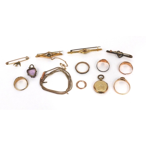 1002 - Selection of mostly gold jewellery including two 9ct gold bar brooches, unmarked gold rings set with... 