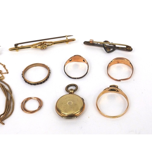 1002 - Selection of mostly gold jewellery including two 9ct gold bar brooches, unmarked gold rings set with... 