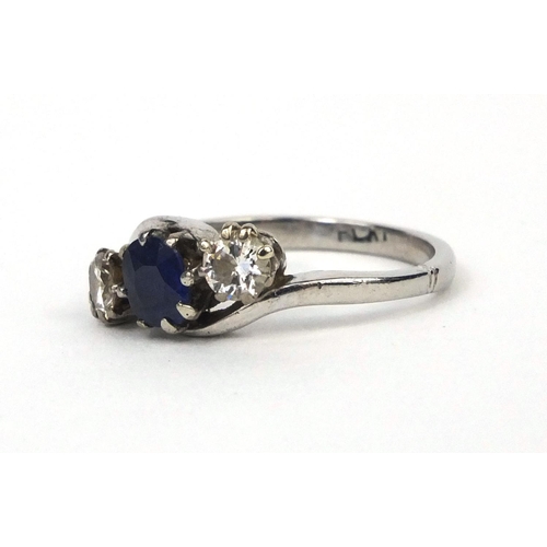 982 - Platinum sapphire and diamond crossover ring, size L, approximate weight  4.0g