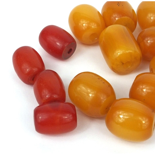 1028 - Collection of butterscotch and cherry amber coloured beads, the largest 2.5cm long, approximate weig... 