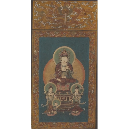 569 - Chinese ink and watercolour onto silk, Guanyin within dragon borders, 130cm x 66cm