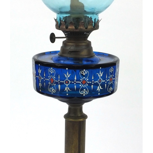 723 - Victorian oil lamp with a facetted hand painted blue glass reservoir  and blue glass shade, 64cm hig... 