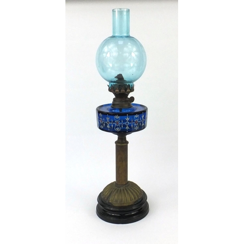 723 - Victorian oil lamp with a facetted hand painted blue glass reservoir  and blue glass shade, 64cm hig... 