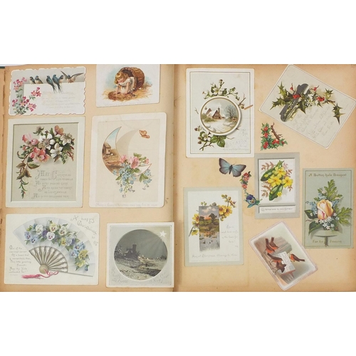 230 - Eight Victorian scrap albums, some with photographs, each containing cut outs including animals, chi... 