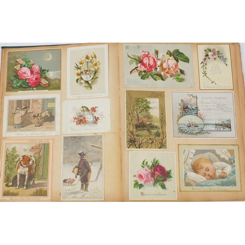 230 - Eight Victorian scrap albums, some with photographs, each containing cut outs including animals, chi... 