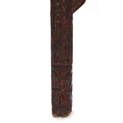 547 - Chinese red lacquered wooden shop hanging, carved with clouse and a dragon, 131cm high