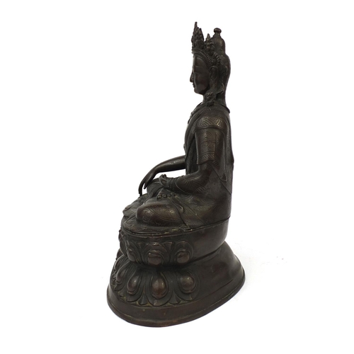 552 - Chino Tibetan bronze Buddha seated in the lotus position, 48cm high