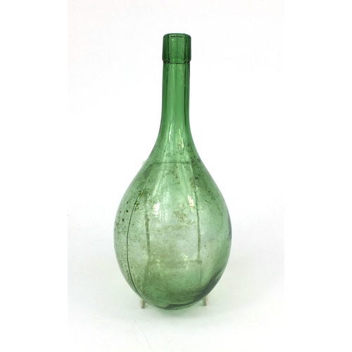 731 - Antique green glass bottle, 30cm in length