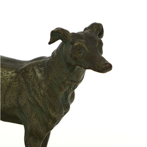 16 - Bronze study of a greyhound mounted on a green onyx ashtray base, 15cm high