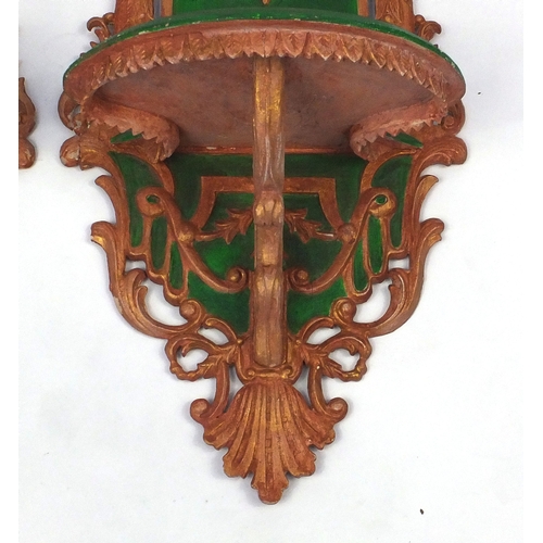 642 - Pair of Turkish wooden wall brackets, hand painted and decorated with script, each 96cm in length