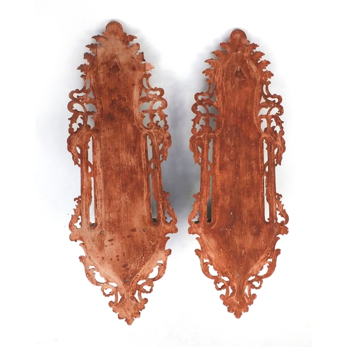 642 - Pair of Turkish wooden wall brackets, hand painted and decorated with script, each 96cm in length