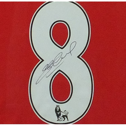 250 - Two signed Steven Gerrard football shirts, comprising one Liverpool shirt and one England shirt sign... 