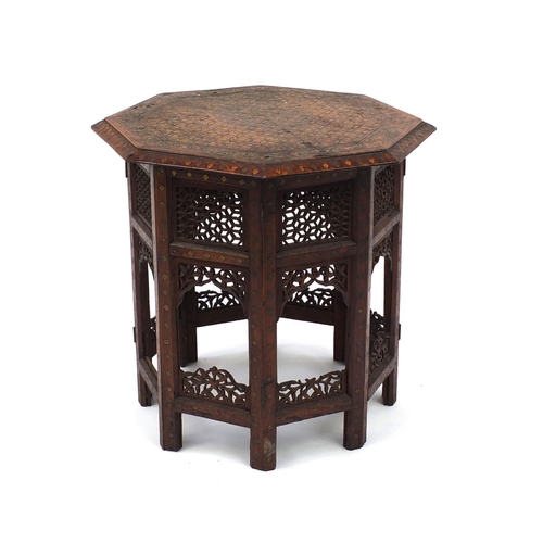 647 - Indian octagonal hardwood table on stand, with metal floral inlay together with a similar rectangula... 