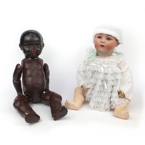 400 - Two large vintage dolls including a bisque headed example with composite limbs, numbered 65 to the b... 