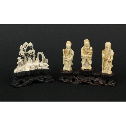 533 - Three Chinese carved ivory figures together with a carved ivory group of three figures below trees, ... 