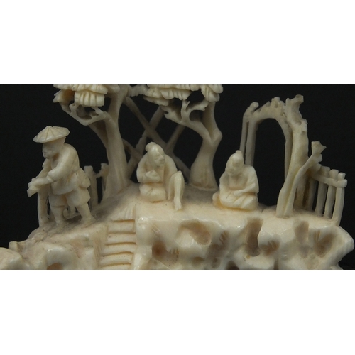 533 - Three Chinese carved ivory figures together with a carved ivory group of three figures below trees, ... 