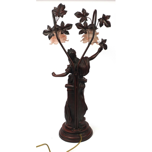 2198 - Art Nouveau style two branch figural desk lamp with pink frilled glass shades, 76cm high