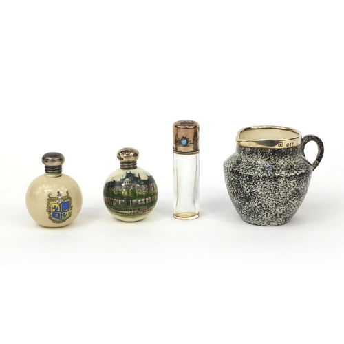 2441 - Three silver topped souvenir china items, together with a silver topped scent bottle, the souvenir c... 